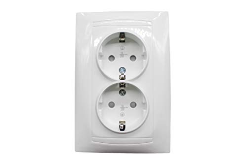 doble base Schuko empotrable 16A, ideal para ofrecer conexiones seguras y confiables en cualquier espacio. Su diseño elegante se integra perfectamente en ambientes modernos.