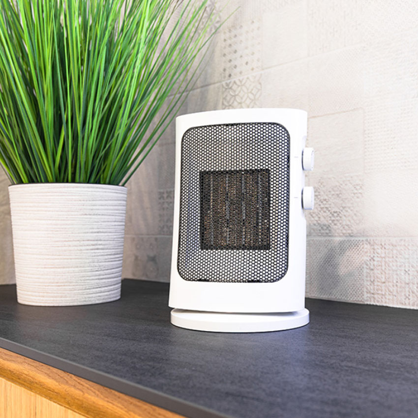 calefactor gris eléctrico vertical de bajo consumo 1500W, oscilante, termostato ajustable. Sistema antivuelco calefactor baño, habitaciones y oficinas